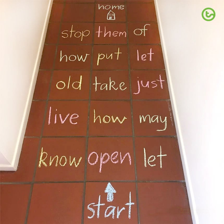 sight word hopscotch game with words written on tiles