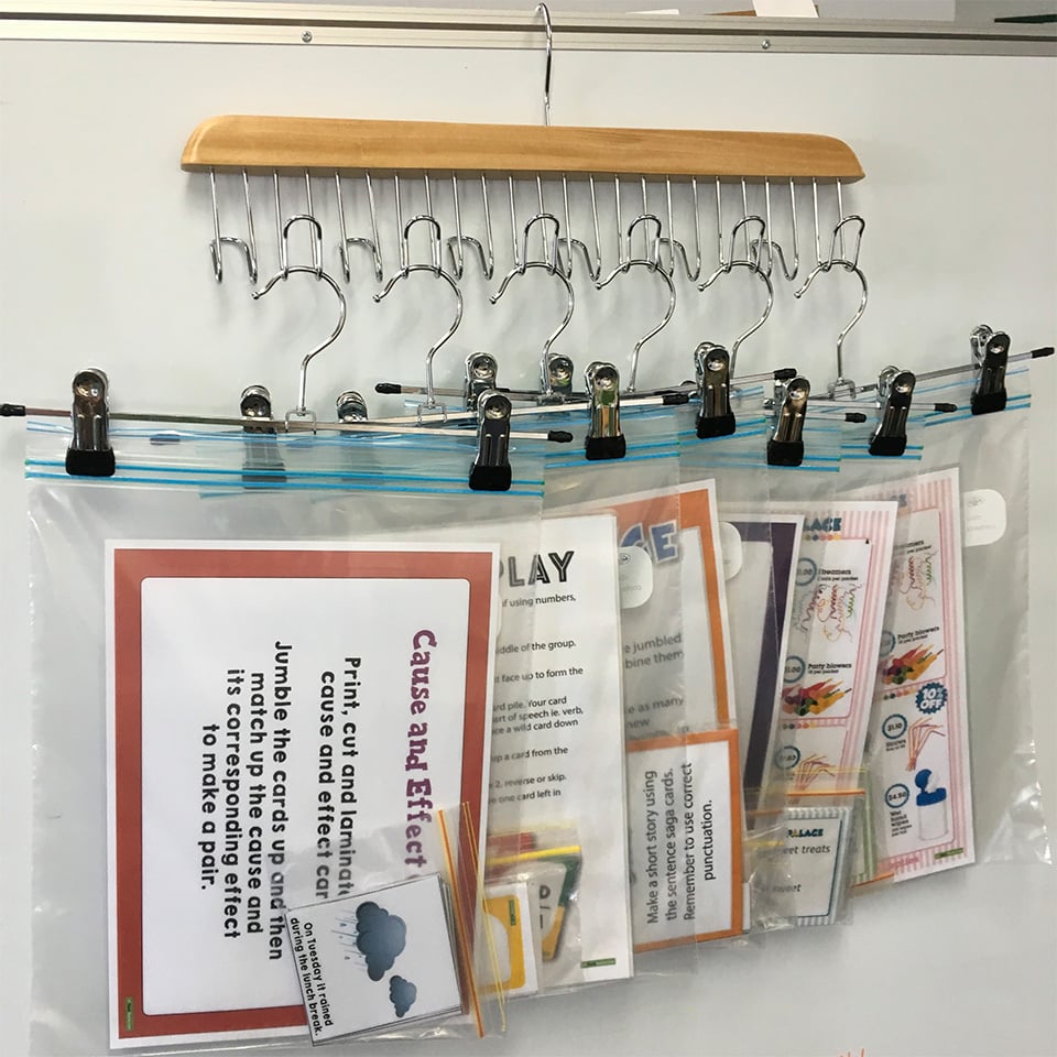task cards stored in ziploc bags by teacher