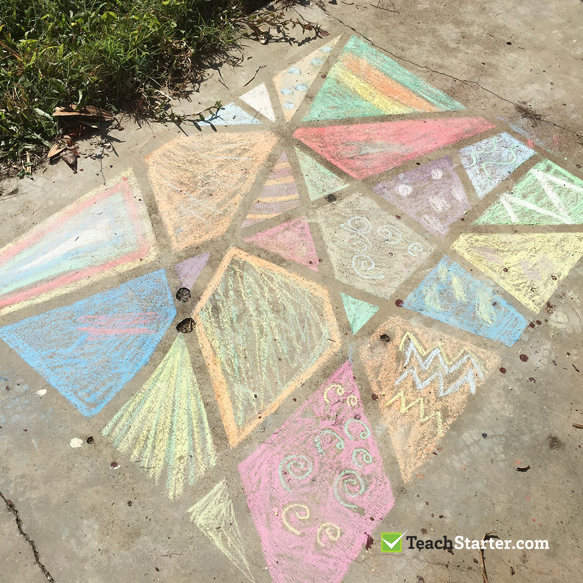 outdoor art activity for young children - chalk line drawing on concrete
