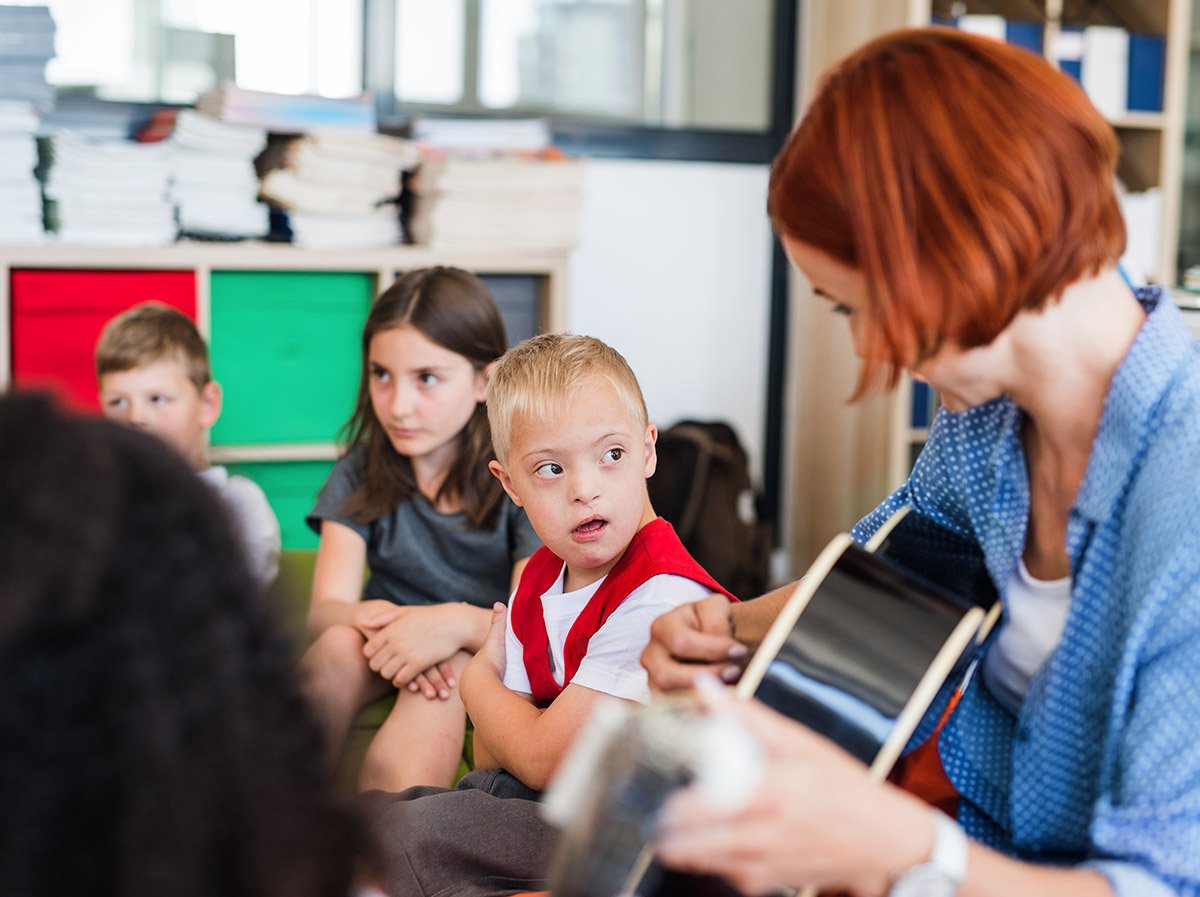 teacher-playing-music-in-the-classroom