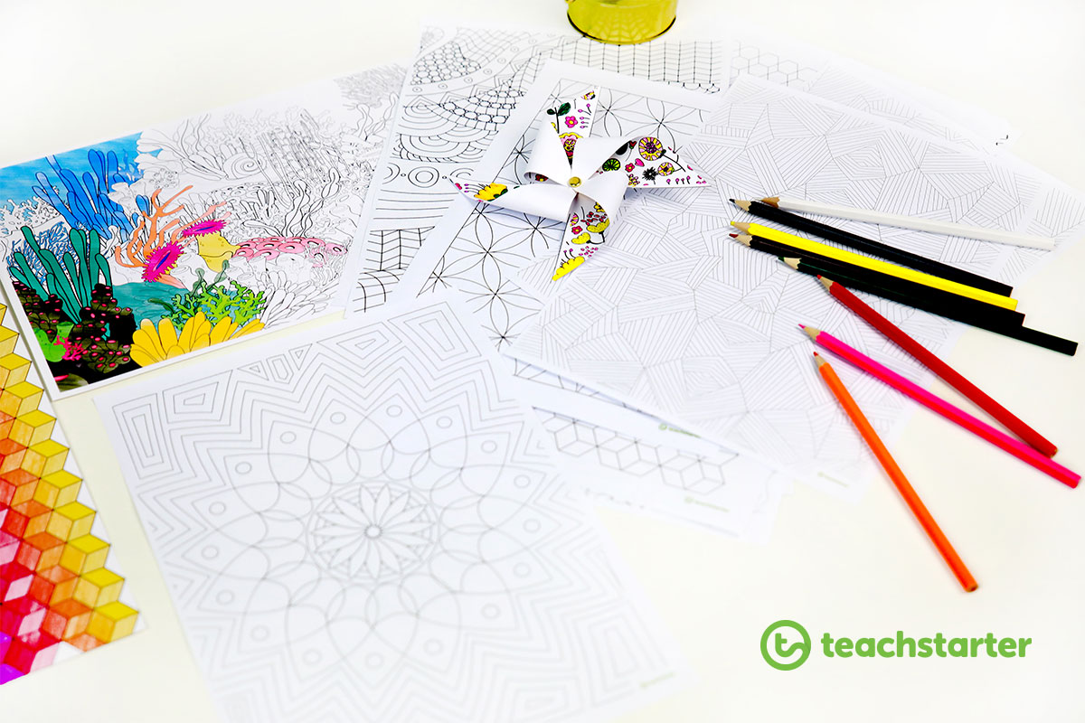 a selection of printable mindfulness colouring sheets with a few pencils laying around