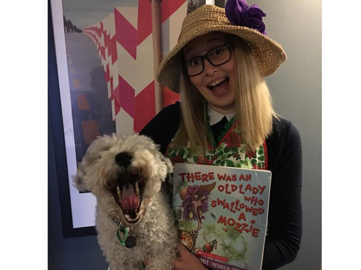 A woman dressed in an old lady costume for Book Week