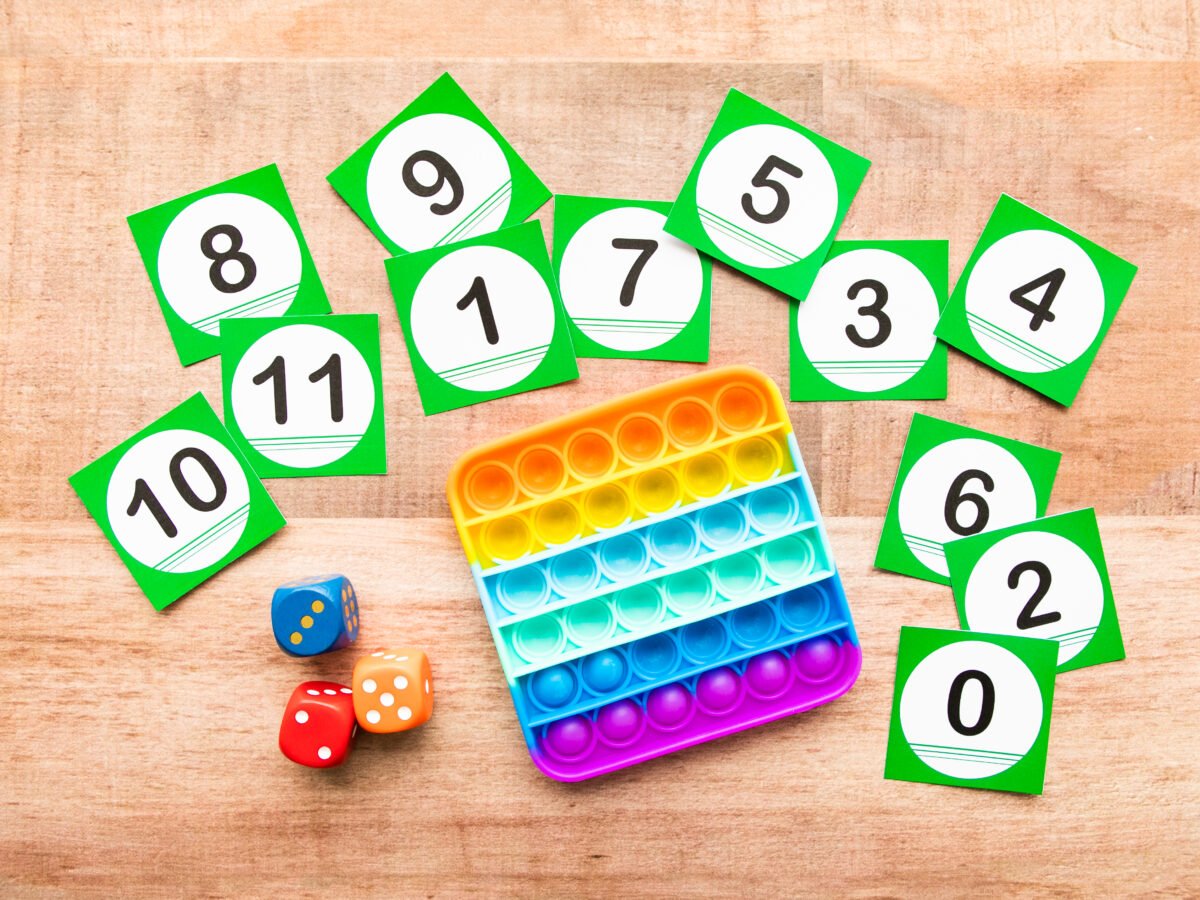 Pop It subitizing activity with dice and number flash cards