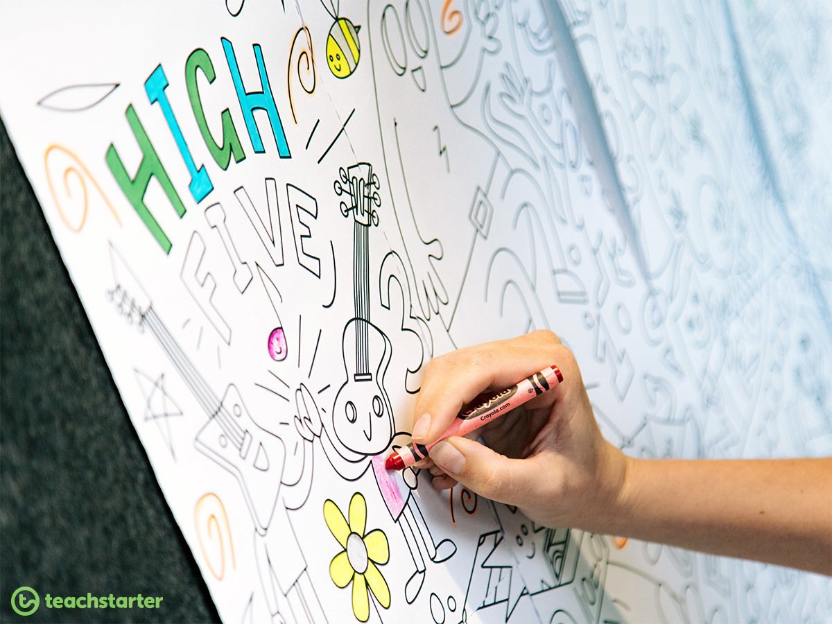 giant coloring page being colored in by one hand