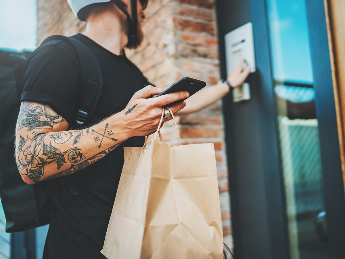 food delivery driver knocking on front door