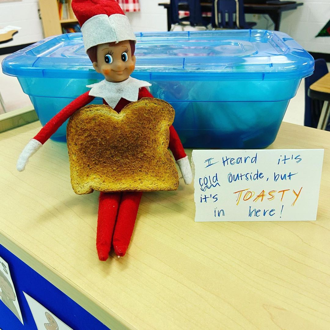 elf on the shelf with a piece of toast