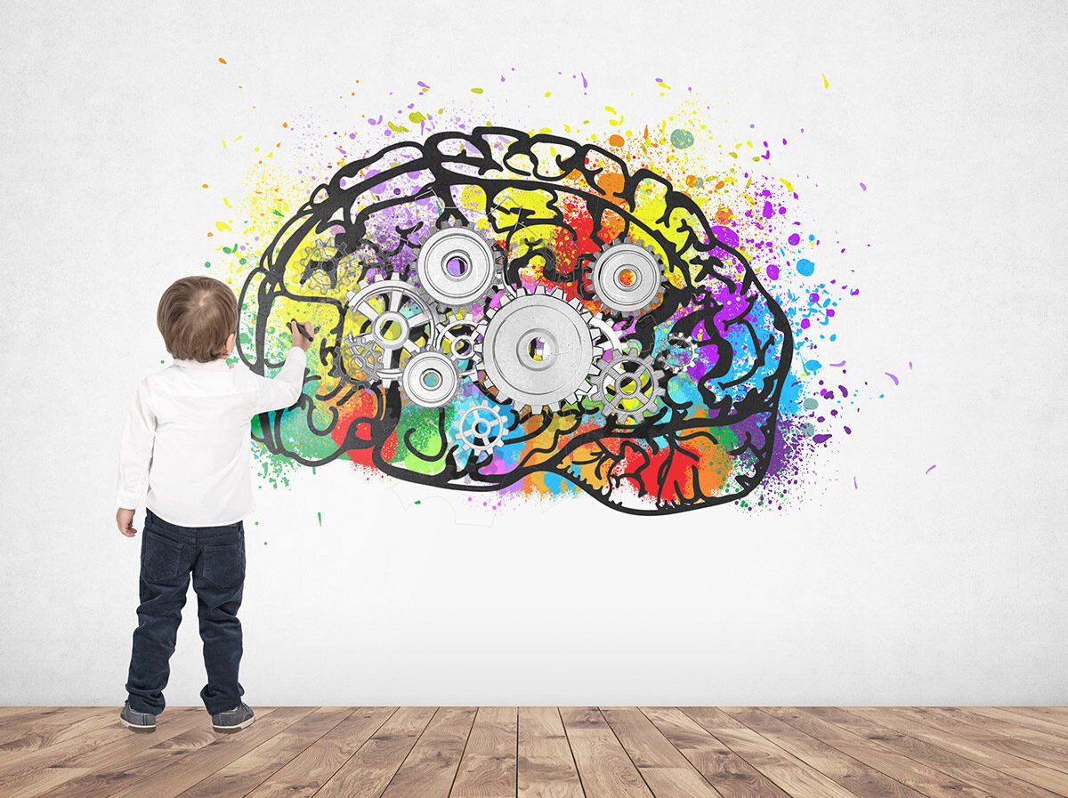 Boy with image of a brain as a motor