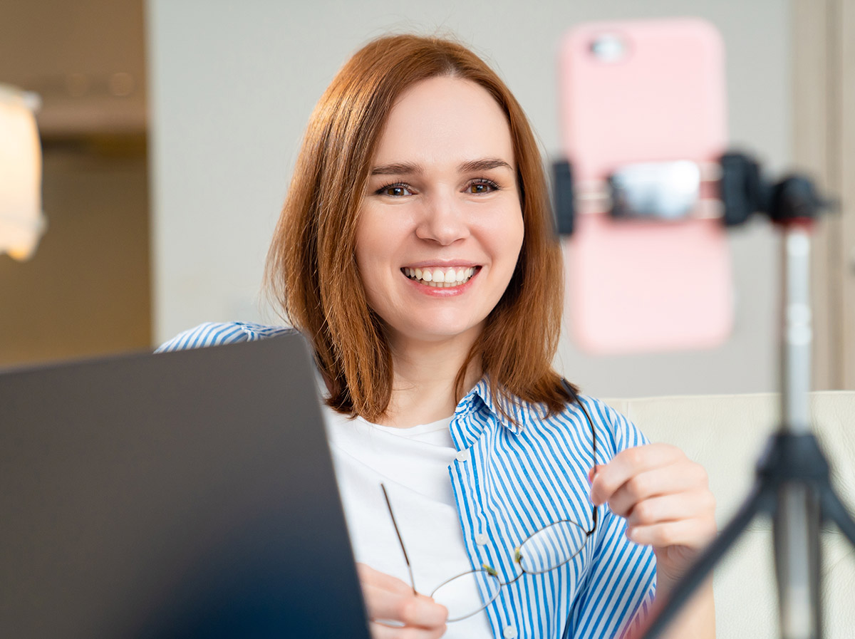 Teacher recording a video to send to students during distance learning