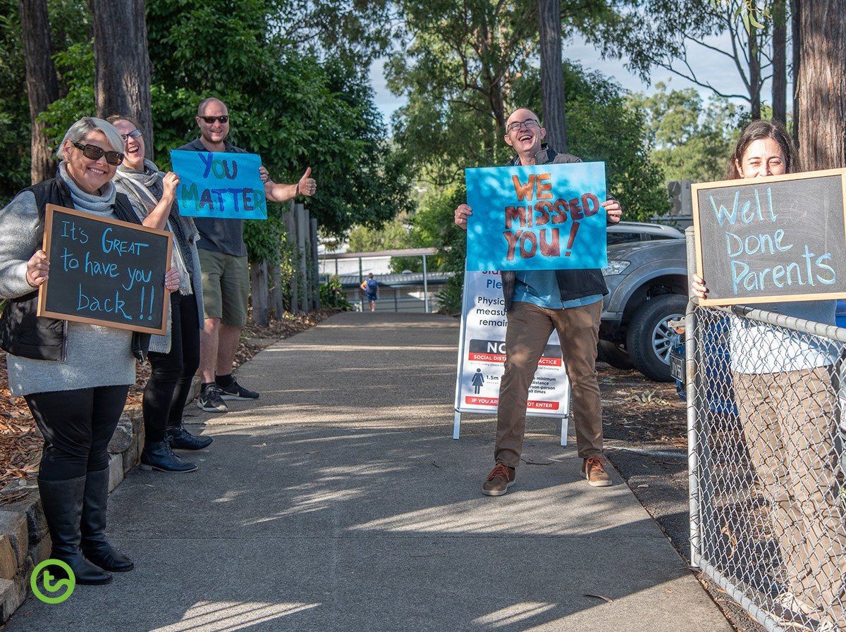 Covid 19 teachers at gate back to school welcome