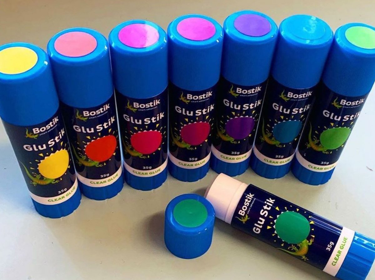 glue sticks with colored dots on the top and bottom to enhance matching