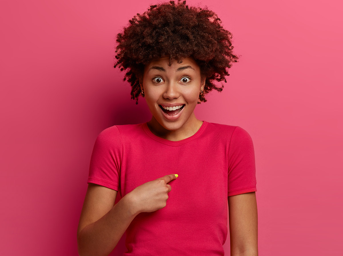 Girl pointing to herself