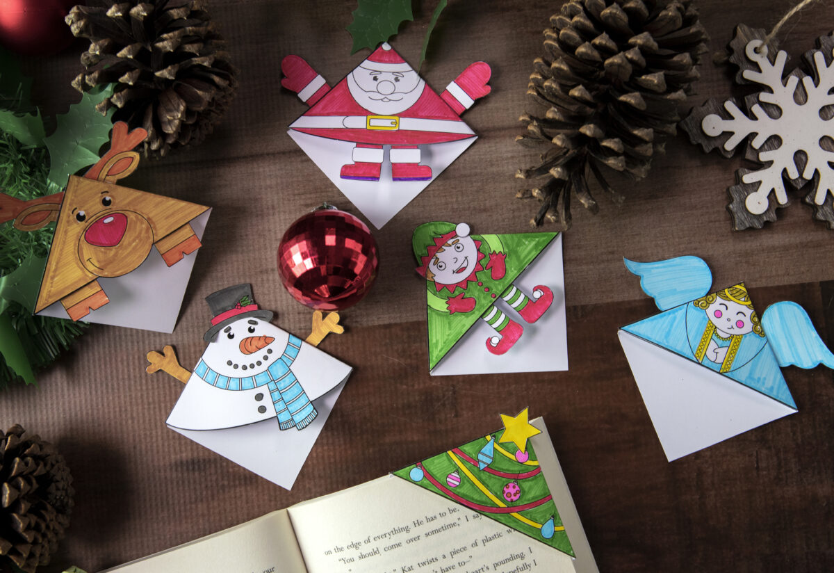 holiday bookmarks craft for kids including snowman, elf, angle, reindeer, and santa