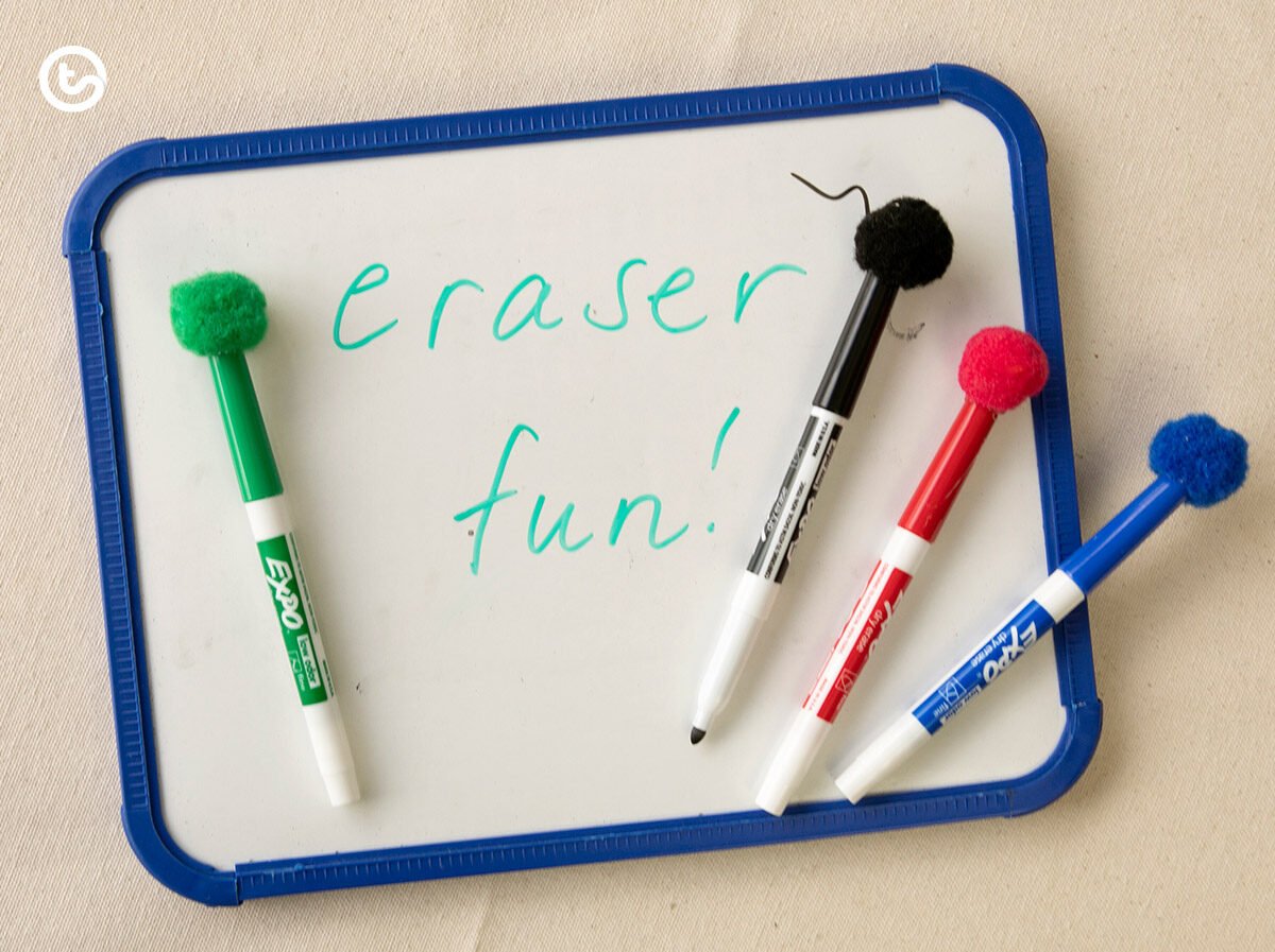 Using pom poms for whiteboard eraser