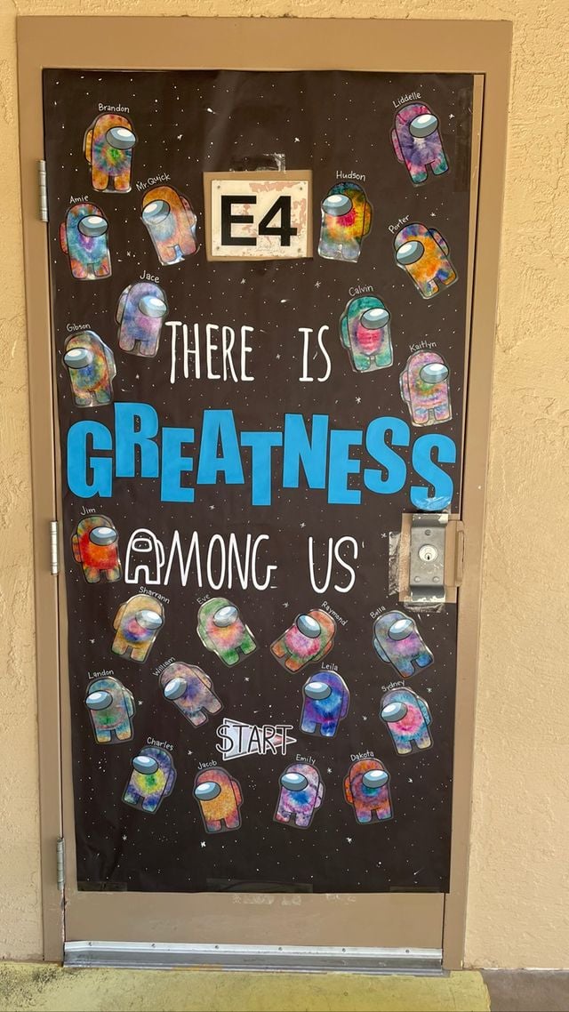 classroom door with there is greatness among us on it