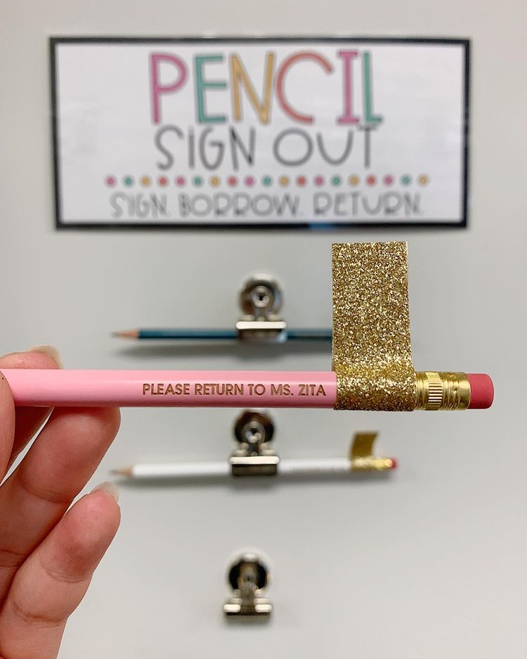 pencil sign out station in teacher's classroom with three pencils