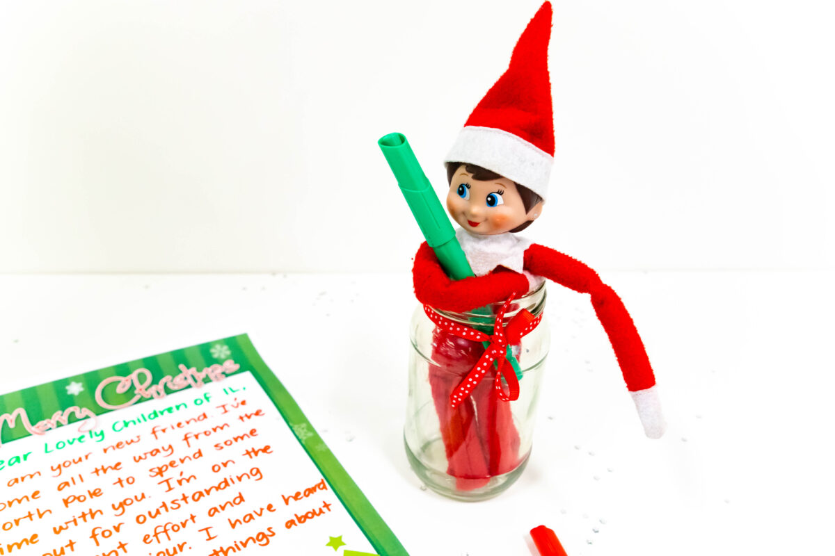 Elf on the shelf in a jar with north pole letter