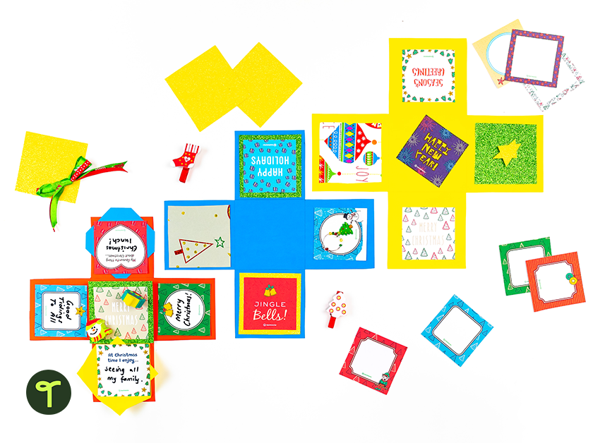 Colorful Christmas Gift Box Crafts for Kids open on table - Teach Starter