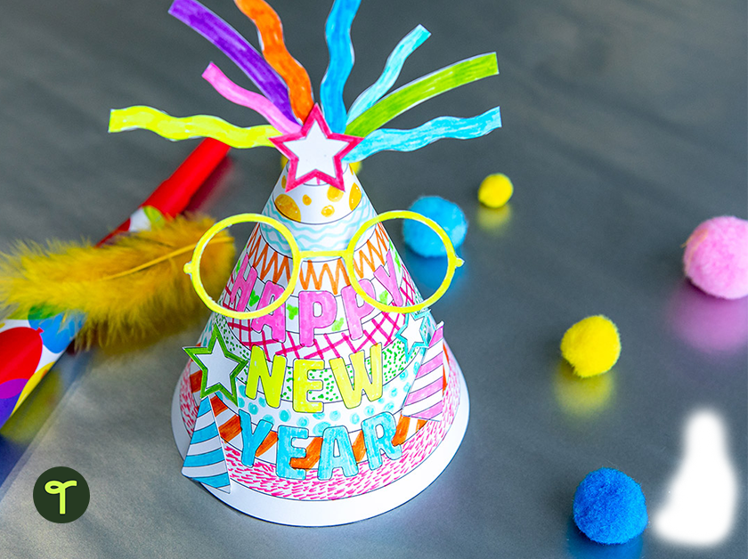 Paper party hat on table - Teach Starter