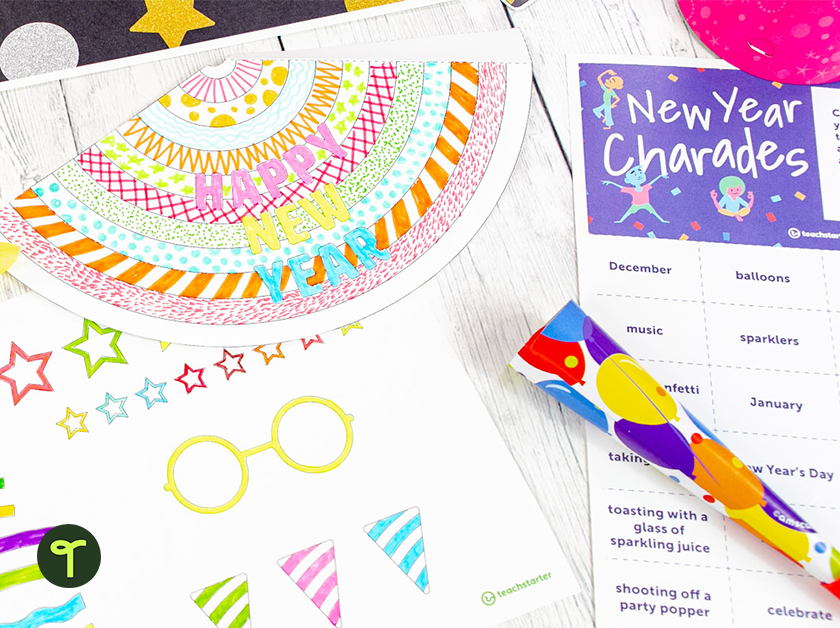New Year Charades Worksheet and Paper Hat Template on Table - Teach Starter