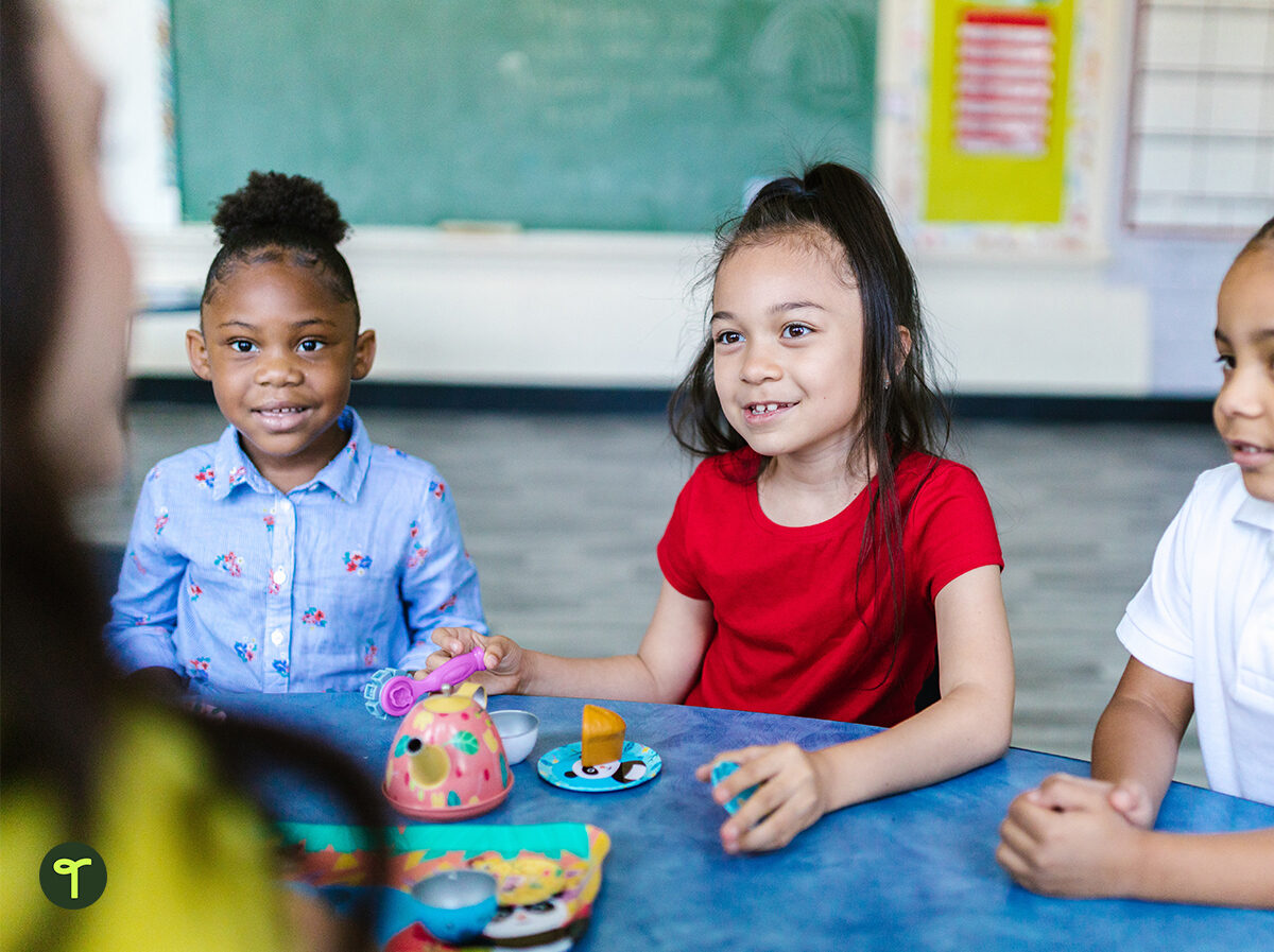 teacher working in centers with kids