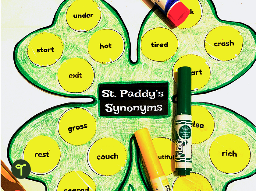St. Paddy's Synonyms activity on a table with markers and a glue stick