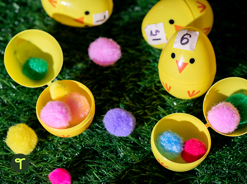 easter egg math activity sits on a table, some eggs are open and some are closed with numbers on them