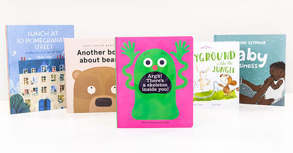 different books for kids are seen side by side on a white background