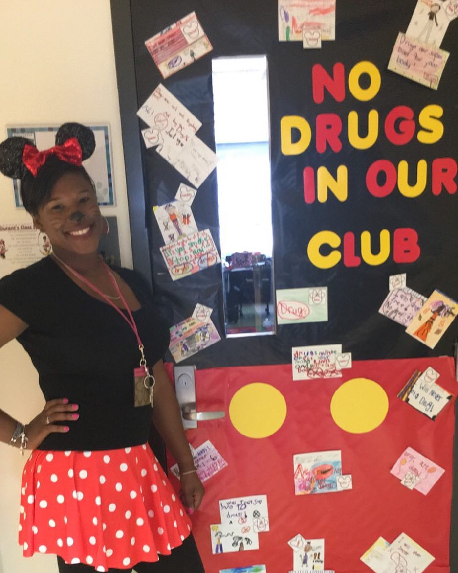 Ms. Durant with Red Ribbon Week door.