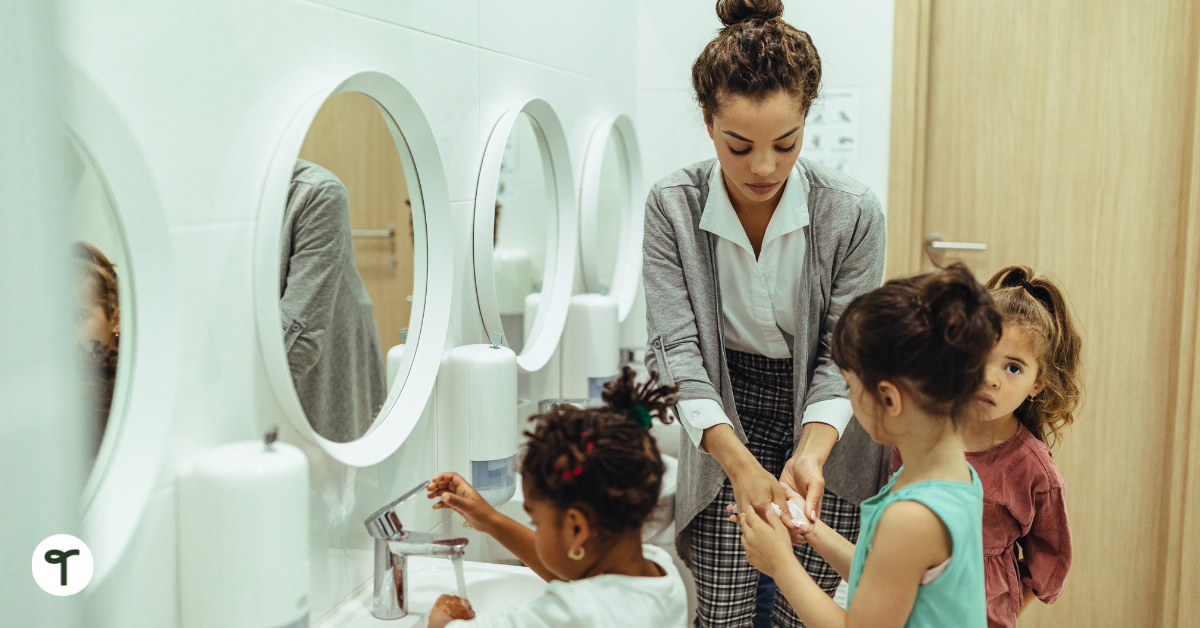 Adult helping children wash hands in bathroom. - Teach Starter