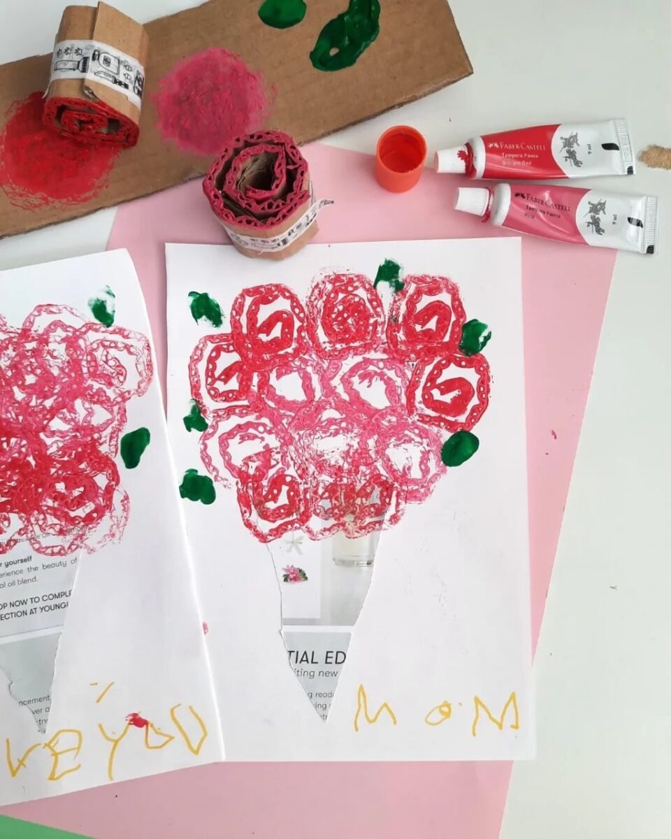 Cardboard Flower Stamps on pink paper