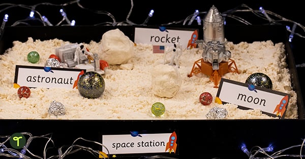 a kid's space diorama including the moon