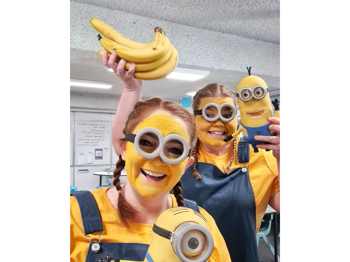 Two woman dressed up as yellow Minion characters for Book Week
