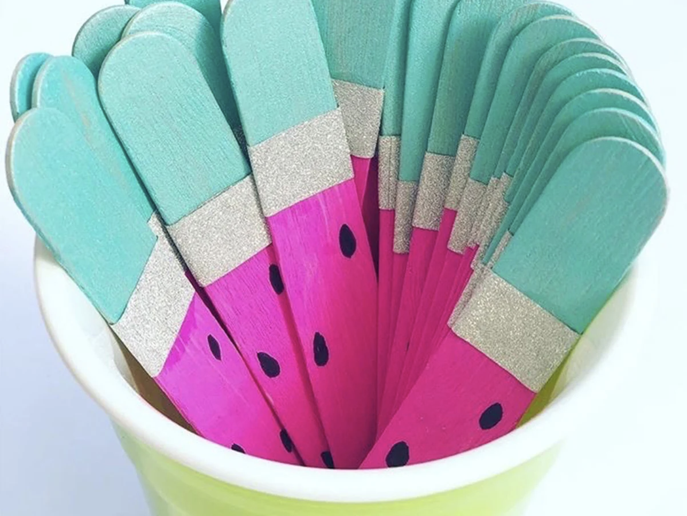 Kmart hacks for teachers: Wooden popsicle sticks with a watermelon print painted on them