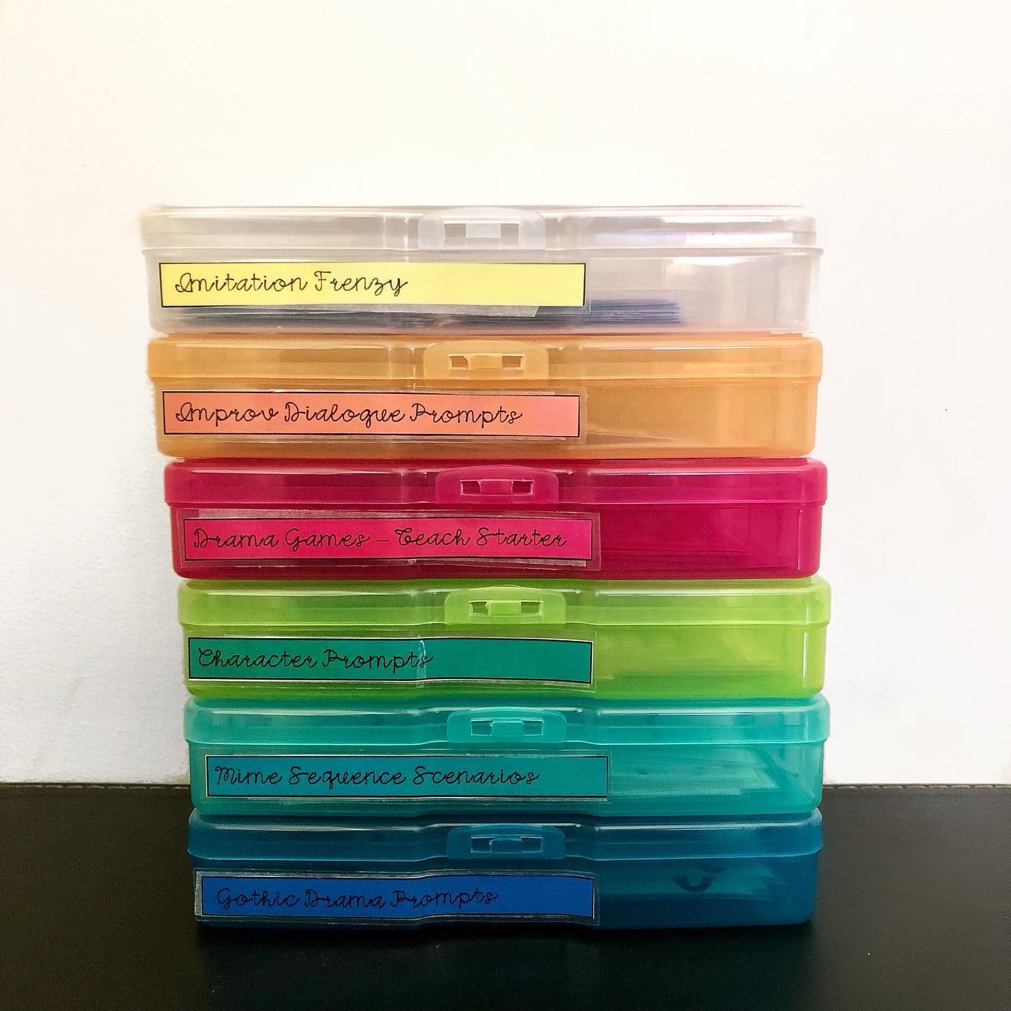 Kmart hacks for teachers: stack of colour plastic containers for task cards