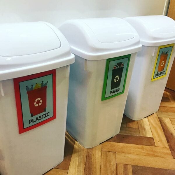 Kmart hacks for teachers: three white bins with recycling, rubbish and compost signs on them