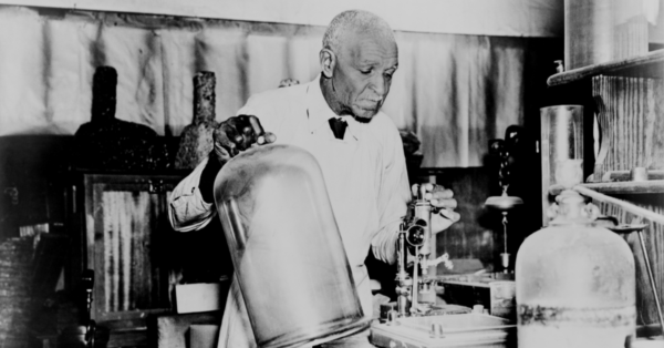 Black and white photo of George Washington Carver in a lab