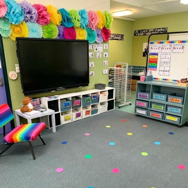 A primary school classroom with a rainbow colour scheme