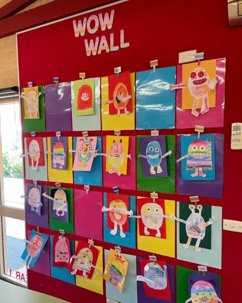 A classroom 'Wow Wall' with monster crafts 