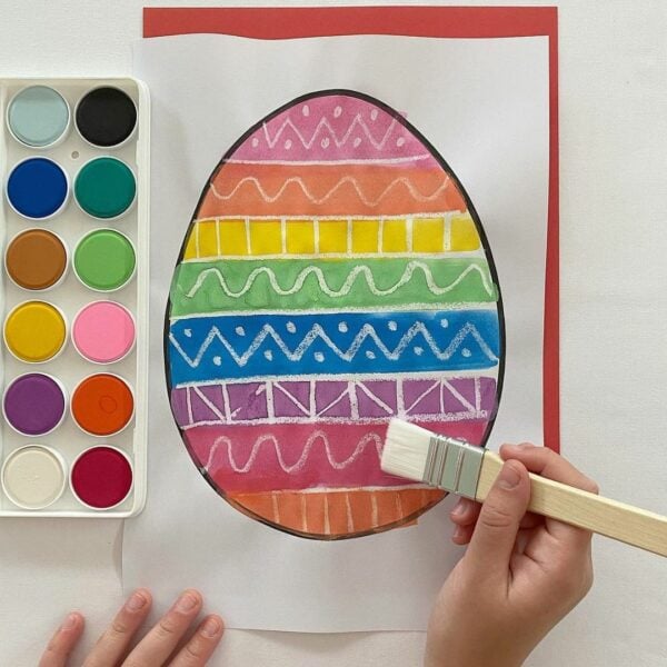 An Easter egg painting on white paper 